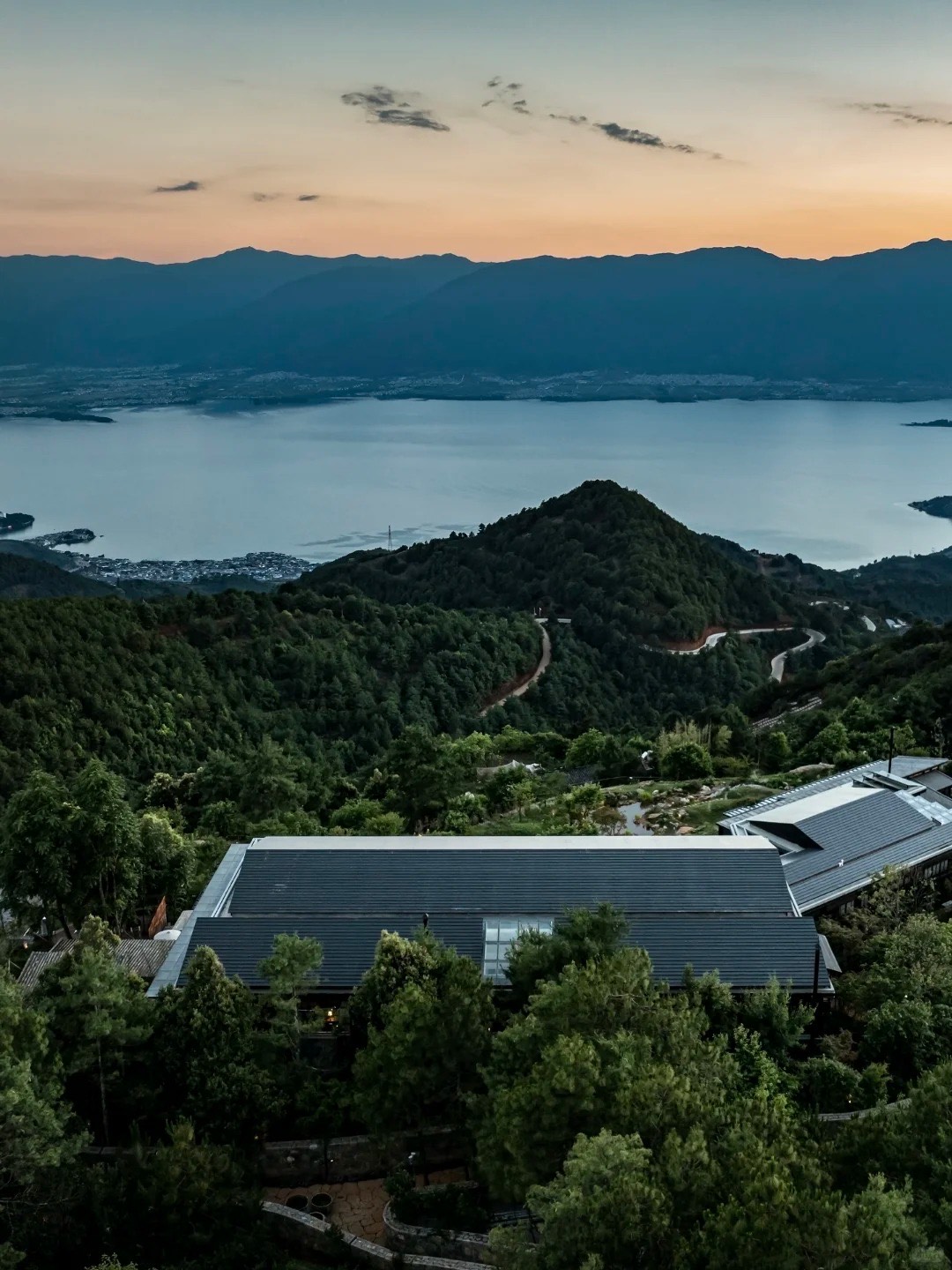 Erhai Lake and Cangshan mountain range in one frame from the summit of Muxi Huoshan Hotel above Shuanglang, Dali