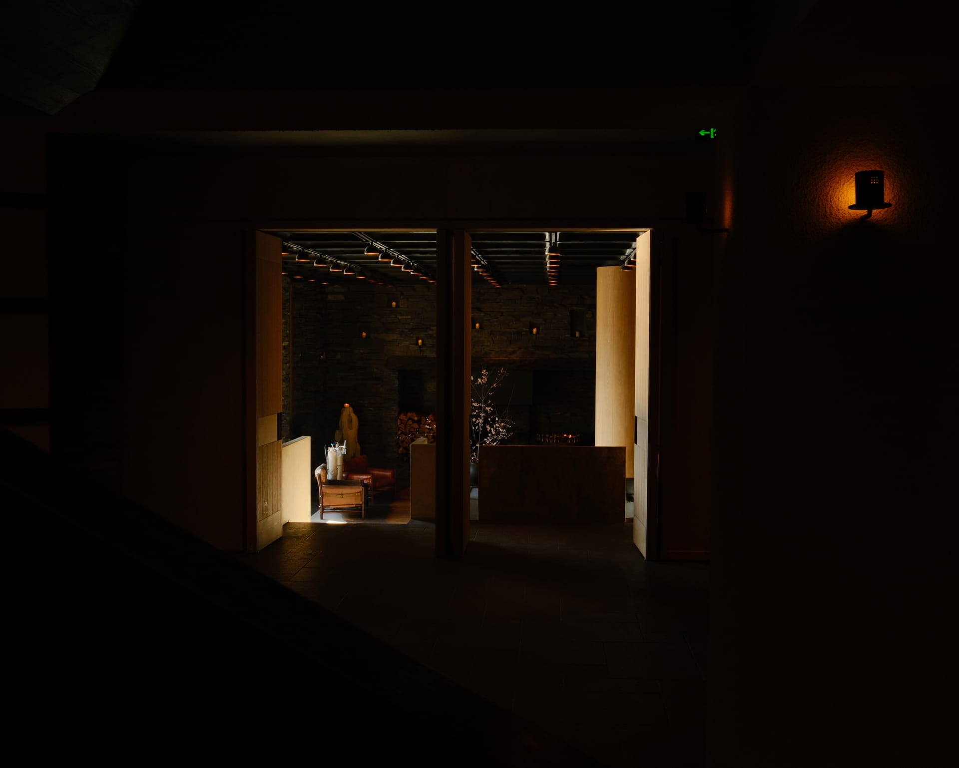 The lobby at dusk — Poodom's daily ritual centres on the mountain across the gorge
