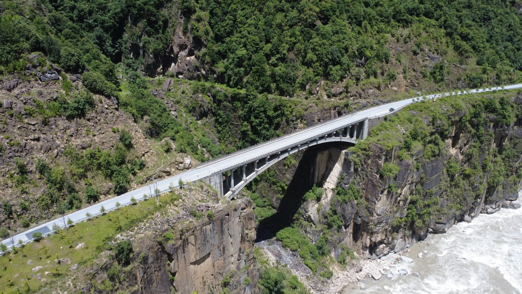 A road bridge over the Nu River gorge north of Bingzhongluo, towards the Tibet border, the river white with rapids far below