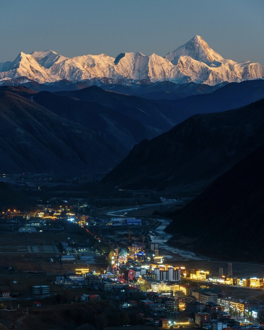 Tibetan village tucked beneath the sacred Gongga summit, Ganzi prefecture, Sichuan