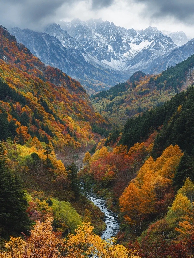 Golden larches and orange maples reflected in a still Jiuzhai Valley lake in late September