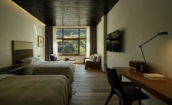 Guest room at Sunyata Wuli camp overlooking the Nujiang gorge