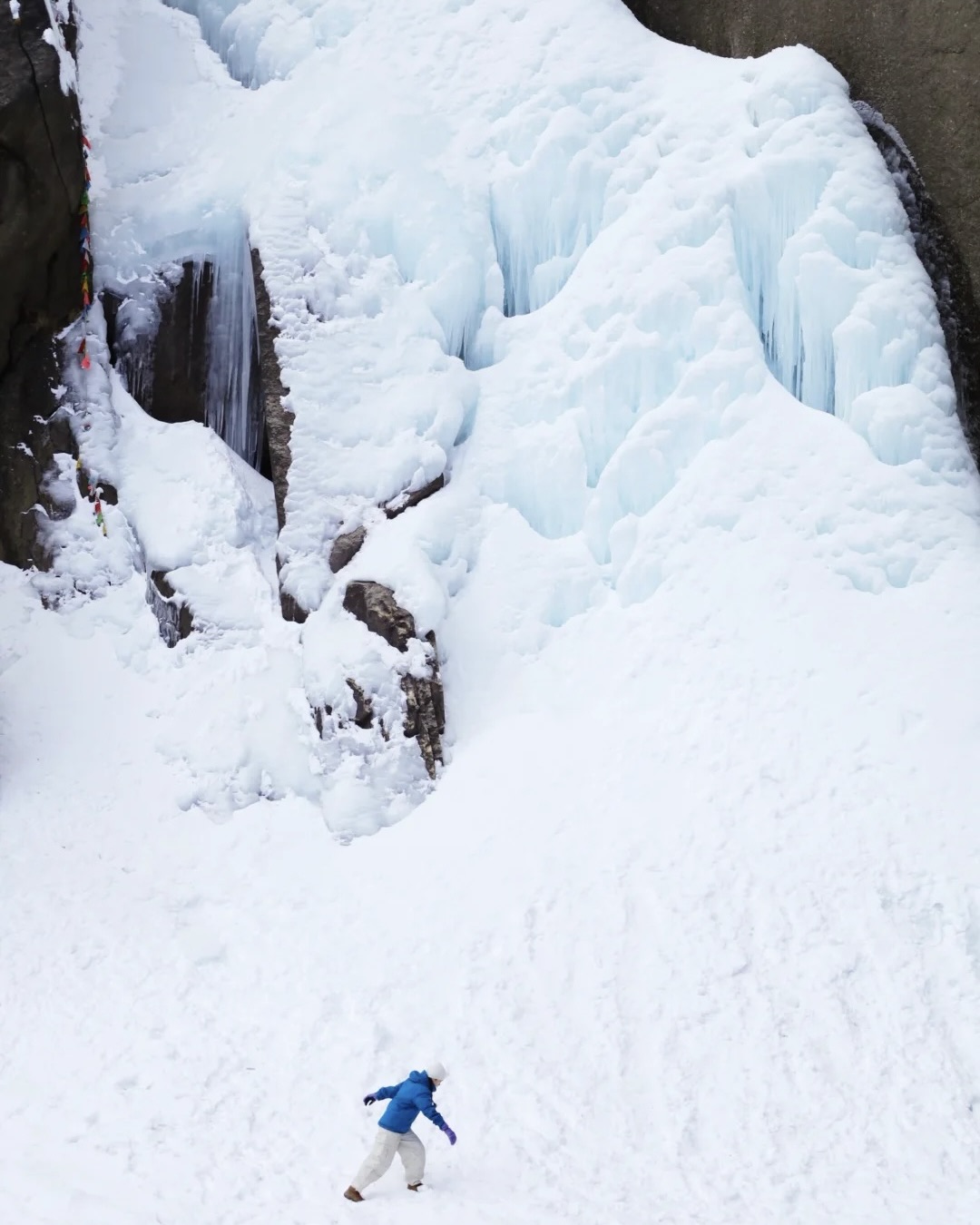 Snow-capped peaks above the frozen Ice Lake — Yubeng winter trek