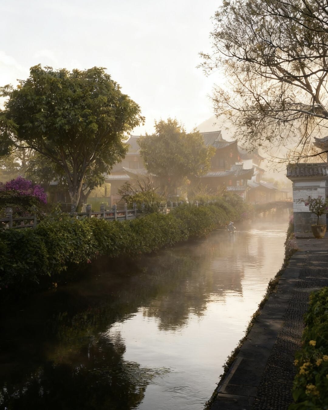 Misty sunrise on a Heshun canal — caravan-merchant town near Tengchong