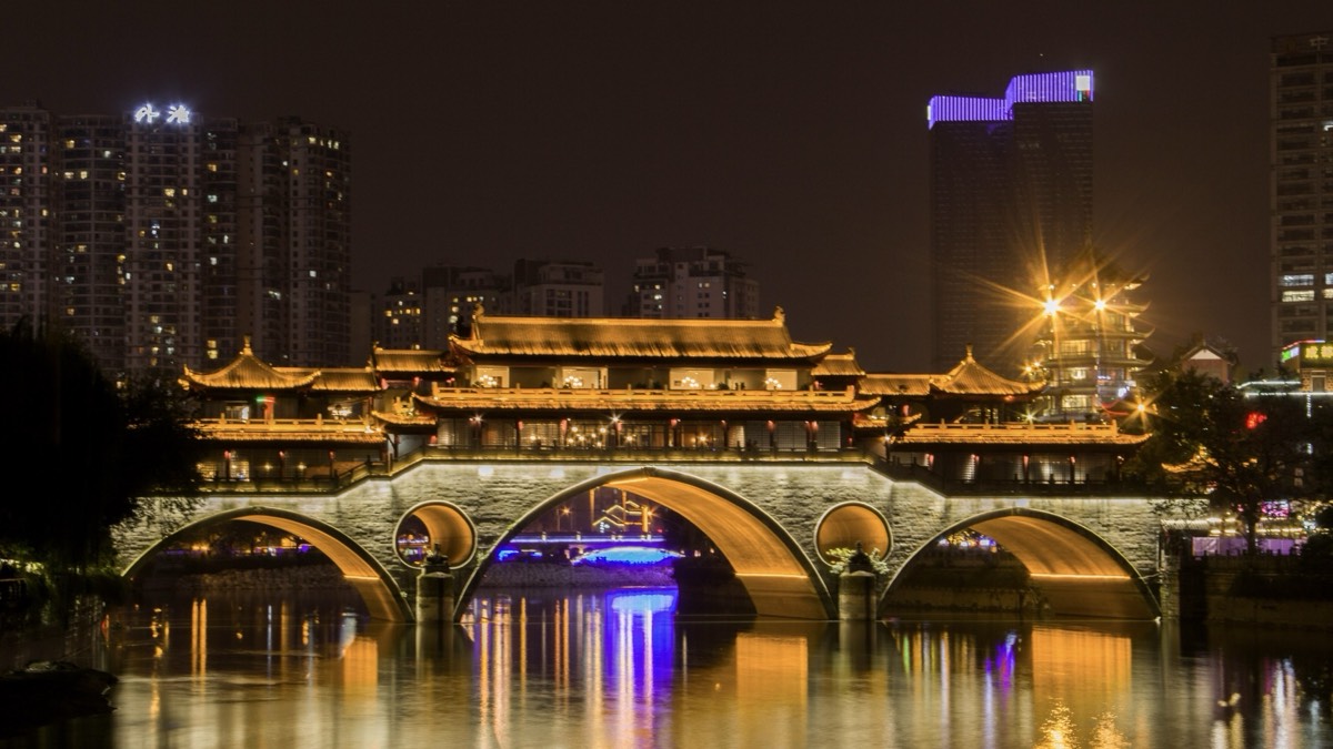 Chengdu's Anshun Bridge illuminated over the Jin River at night