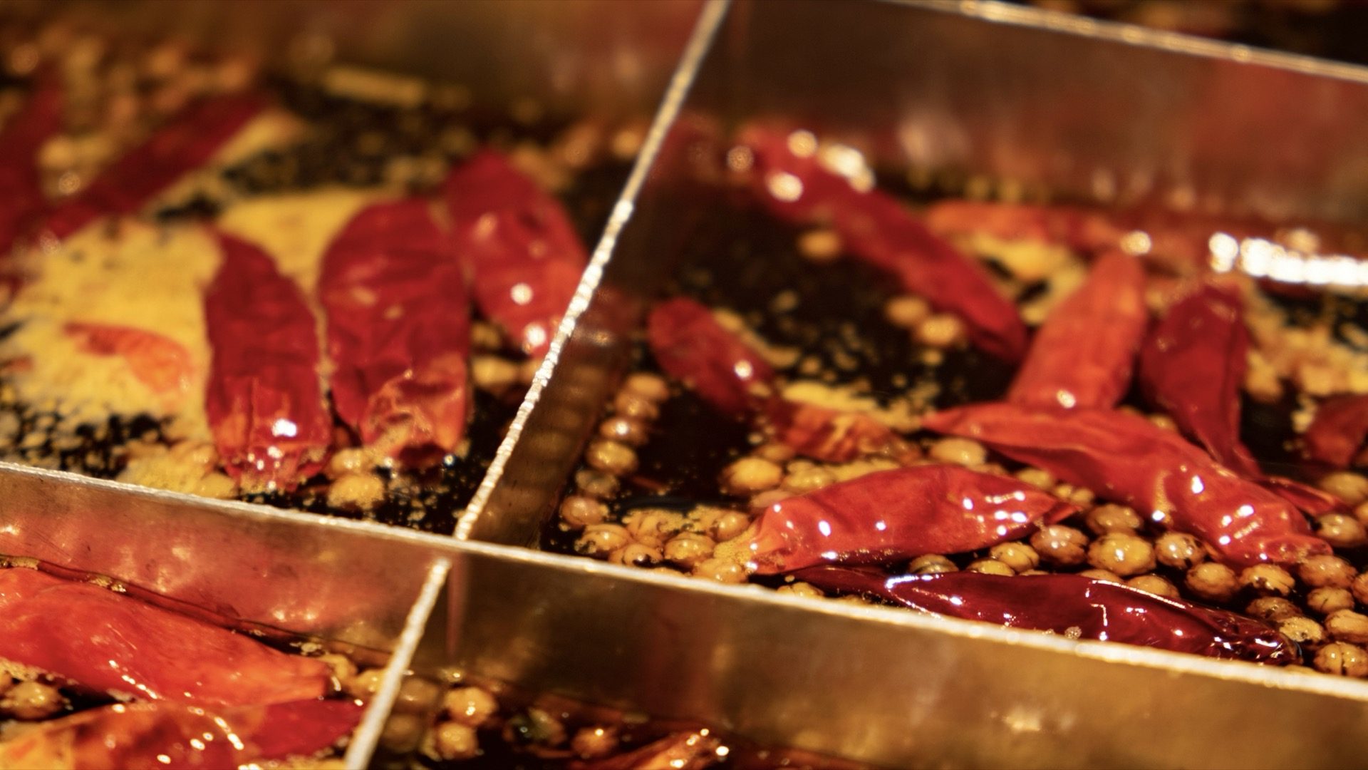 Dried chillies and Sichuan peppercorns in a fiery hotpot broth