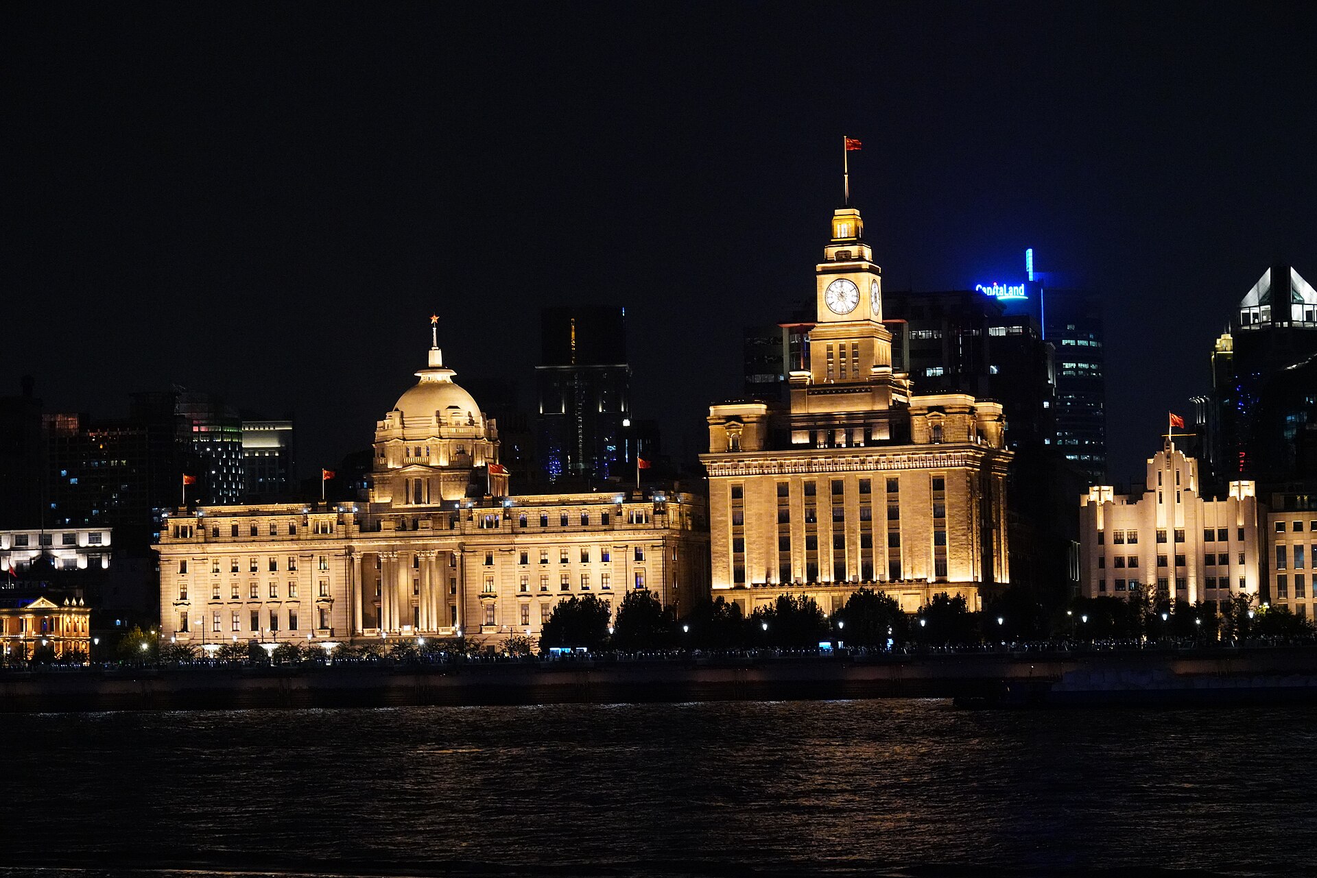 The floodlit 1920s banking houses along the Bund at night, Shanghai — Classic China tour