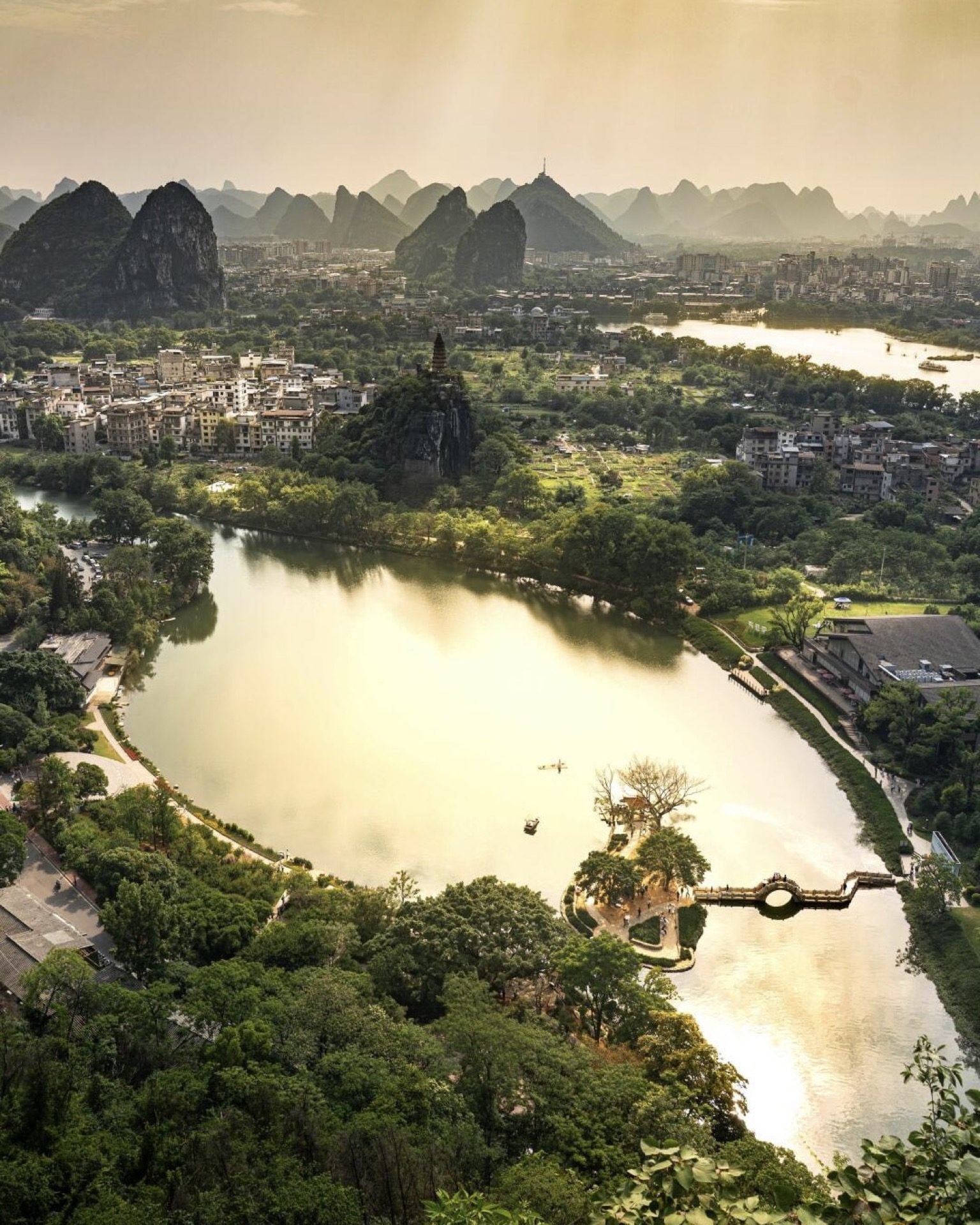 Aerial sunset view over Chuanshan Park's pagodas and karst landscape, Guilin — Guilin private tour