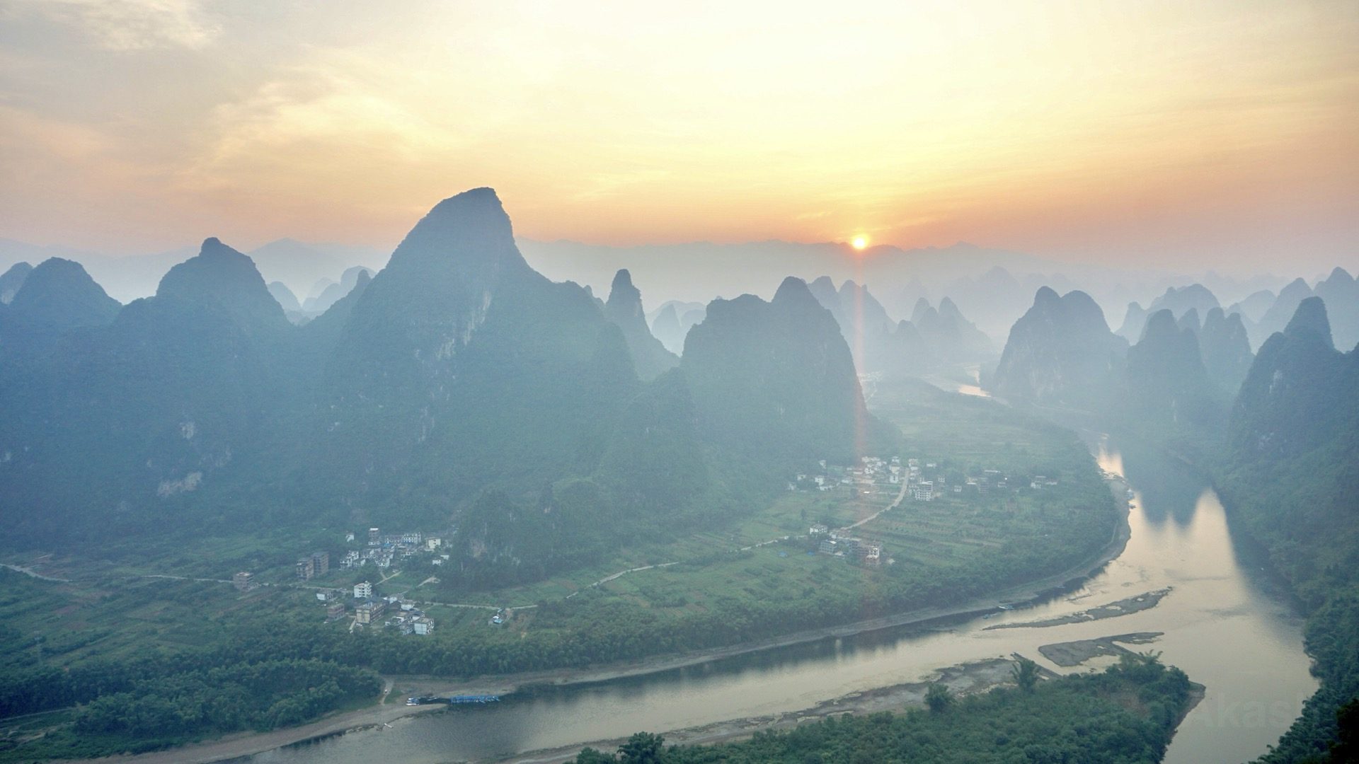 Sunrise panorama from Xianggong Hill over a sea of Li River karst peaks, Guilin — Guilin private tour