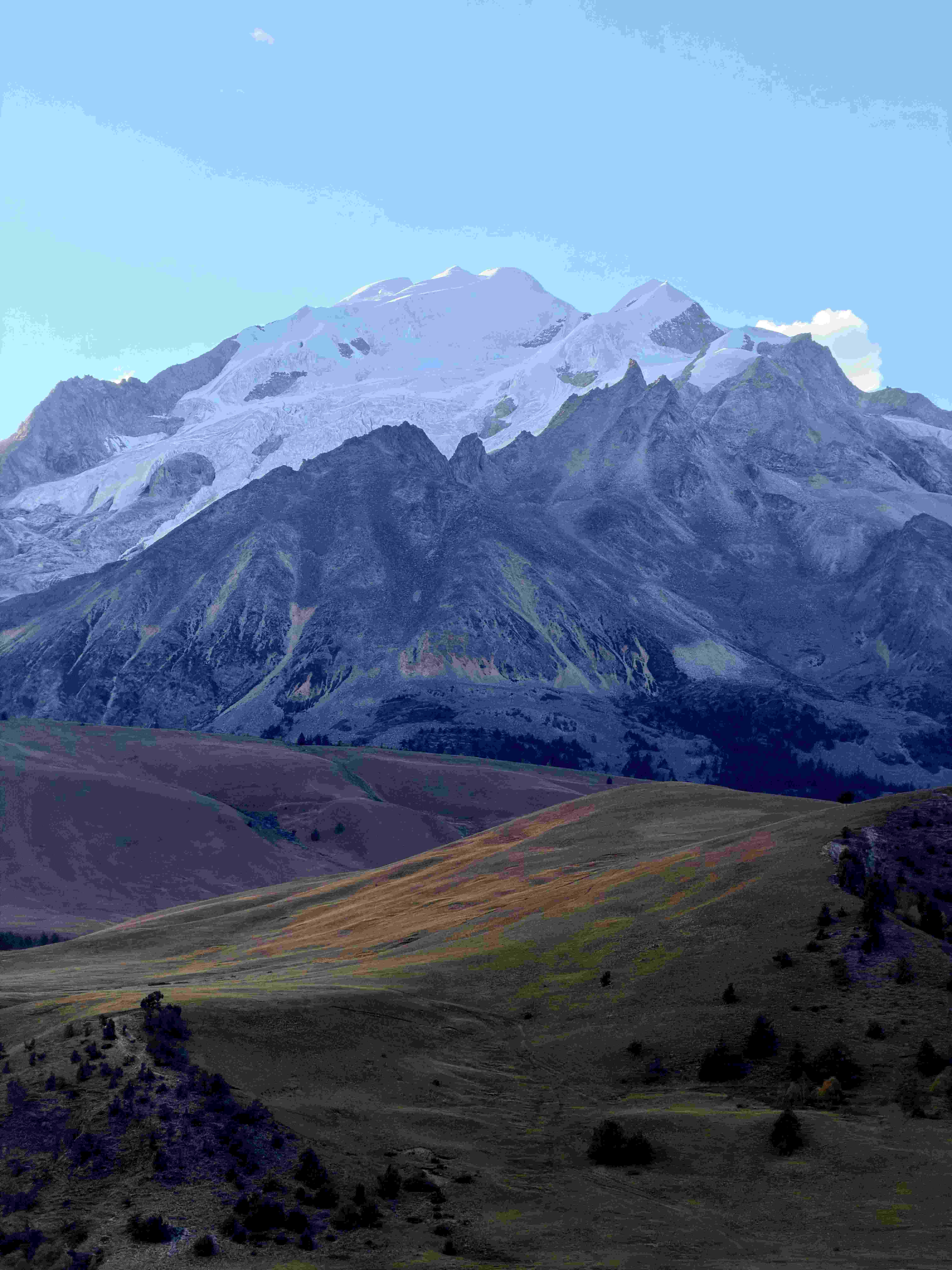 A snow-capped sacred peak rising above an autumn hillside in West Sichuan — hero image for the Sacred Peaks private tour by Boutique China