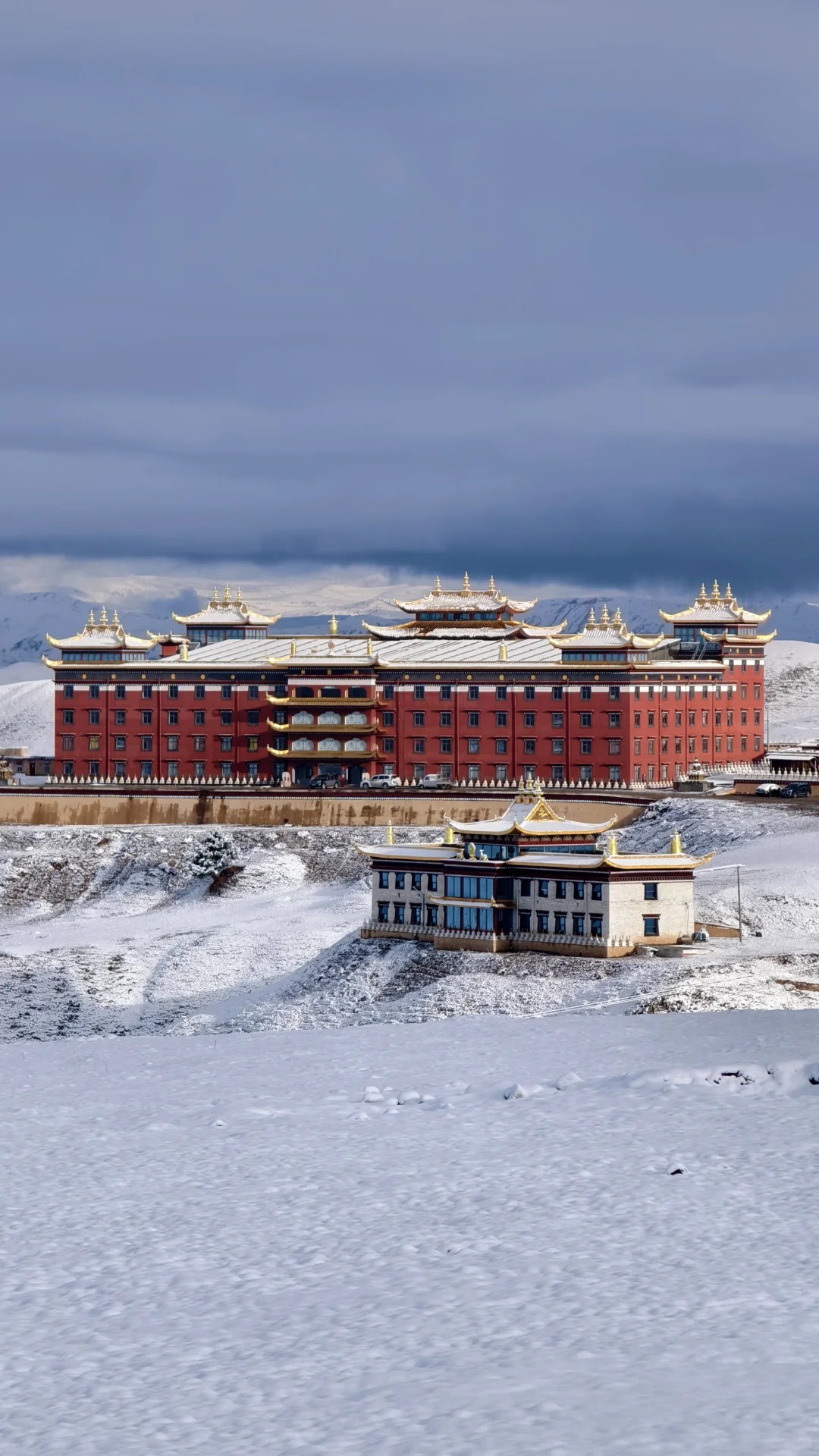 Yala Snow Mountain rising above Kangding — the first sacred peak sighting as you enter the Tibetan cultural belt