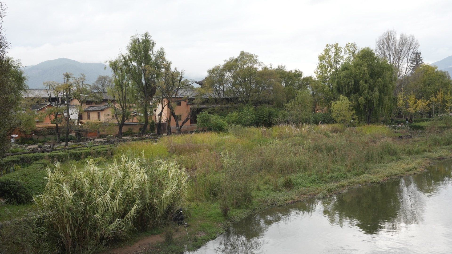 Red lanterns hanging from the ancient caravan gateway, Shaxi Old Town