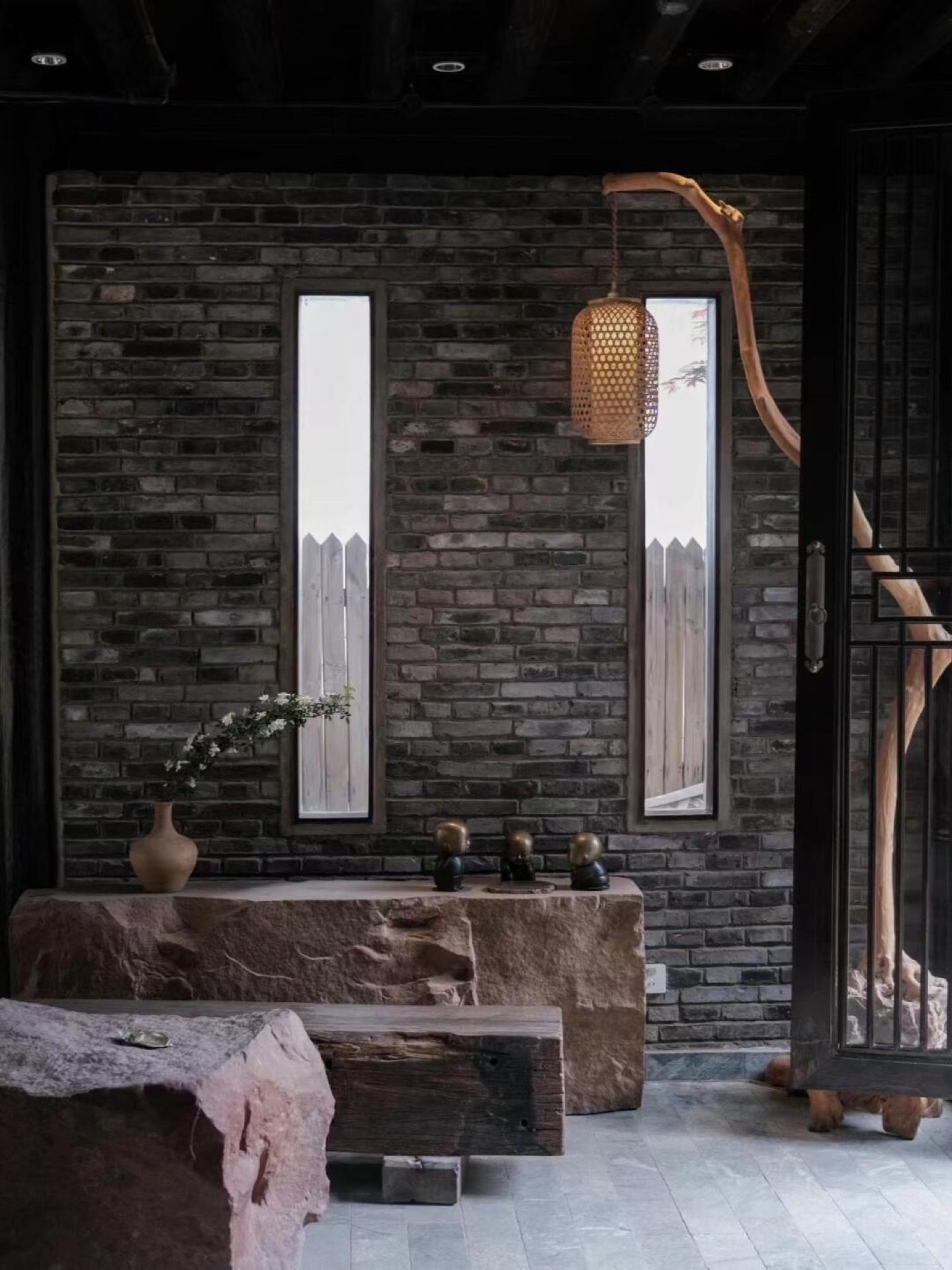 Fragment of Shaxi old town showing weathered rammed-earth walls and stone paving — Yunnan slow culture tour