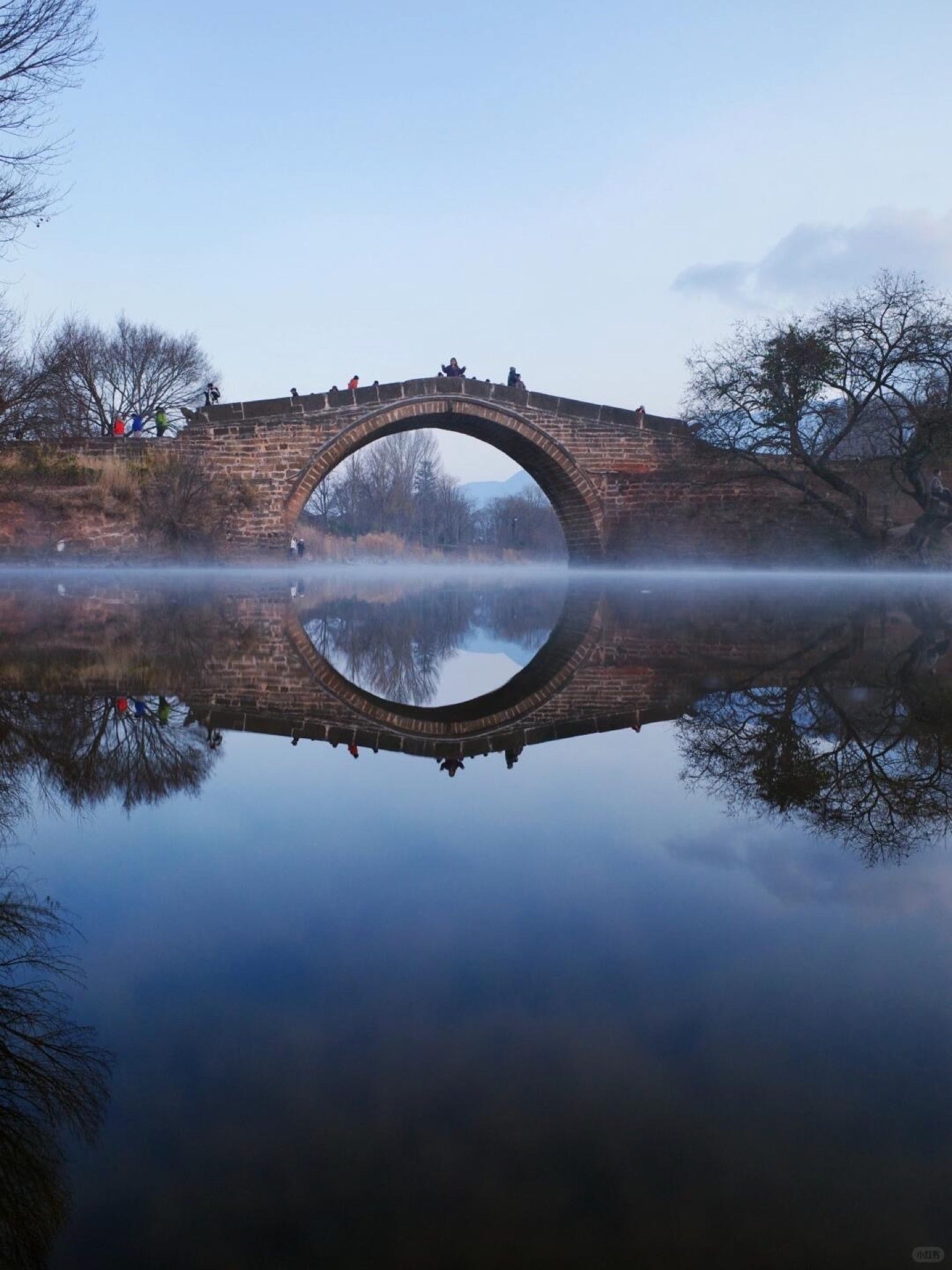 Morning mist drifting through Yuejin village fields on the edge of Shaxi, Yunnan — Yunnan slow culture tour