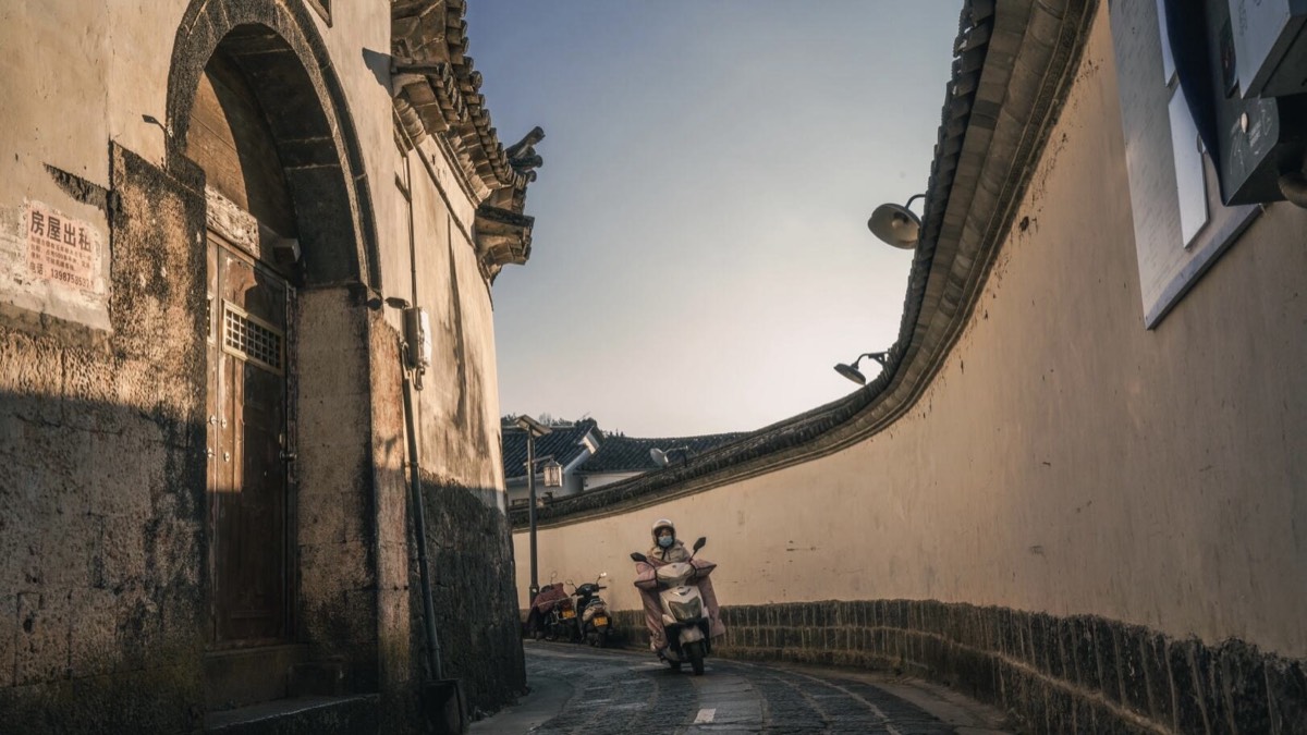 Stone-paved alley in Heshun Ancient Town's Ming-era trading quarter