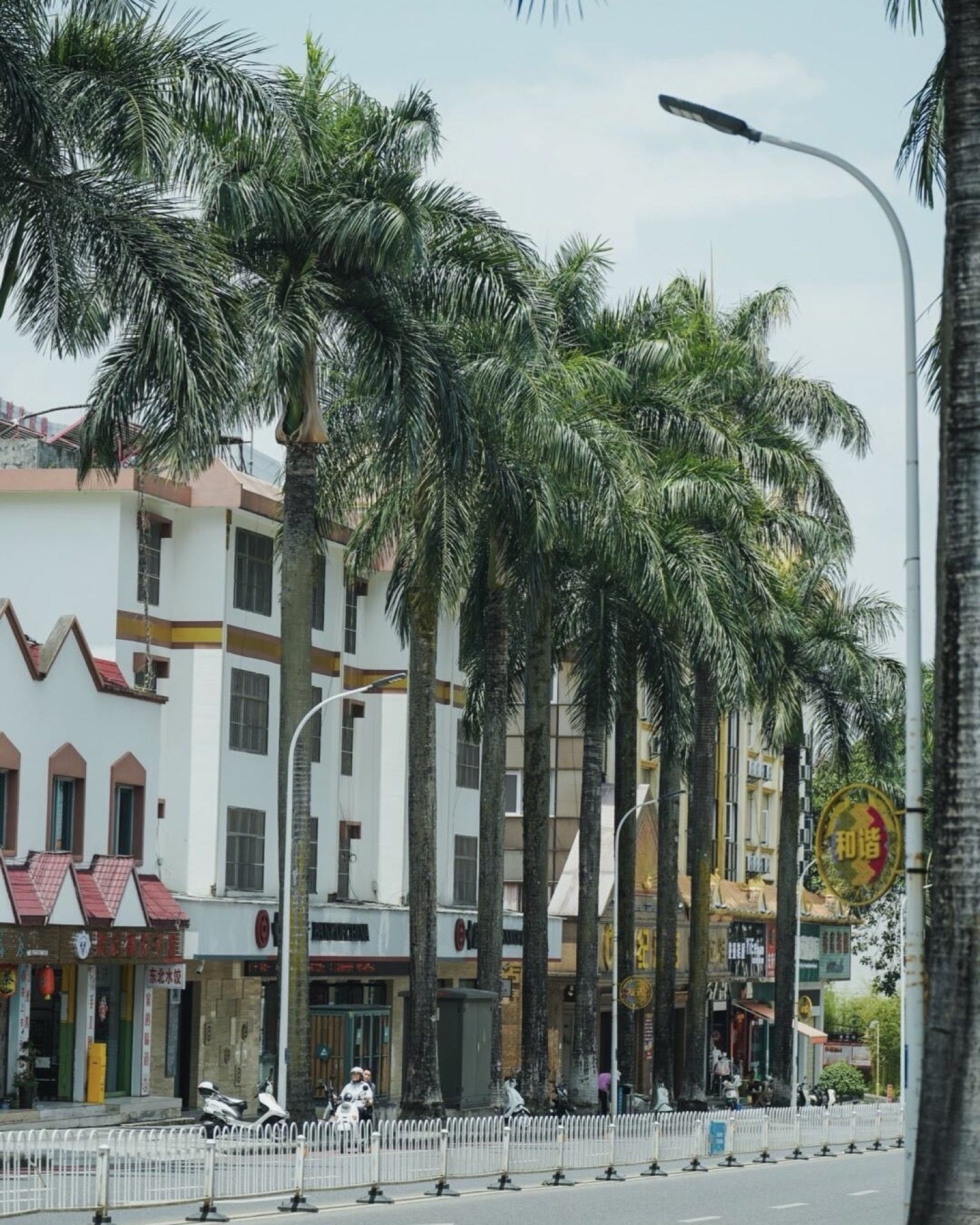 Slow border-town life in Mangshi with locals relaxing in the tropical afternoon — Yunnan slow culture tour