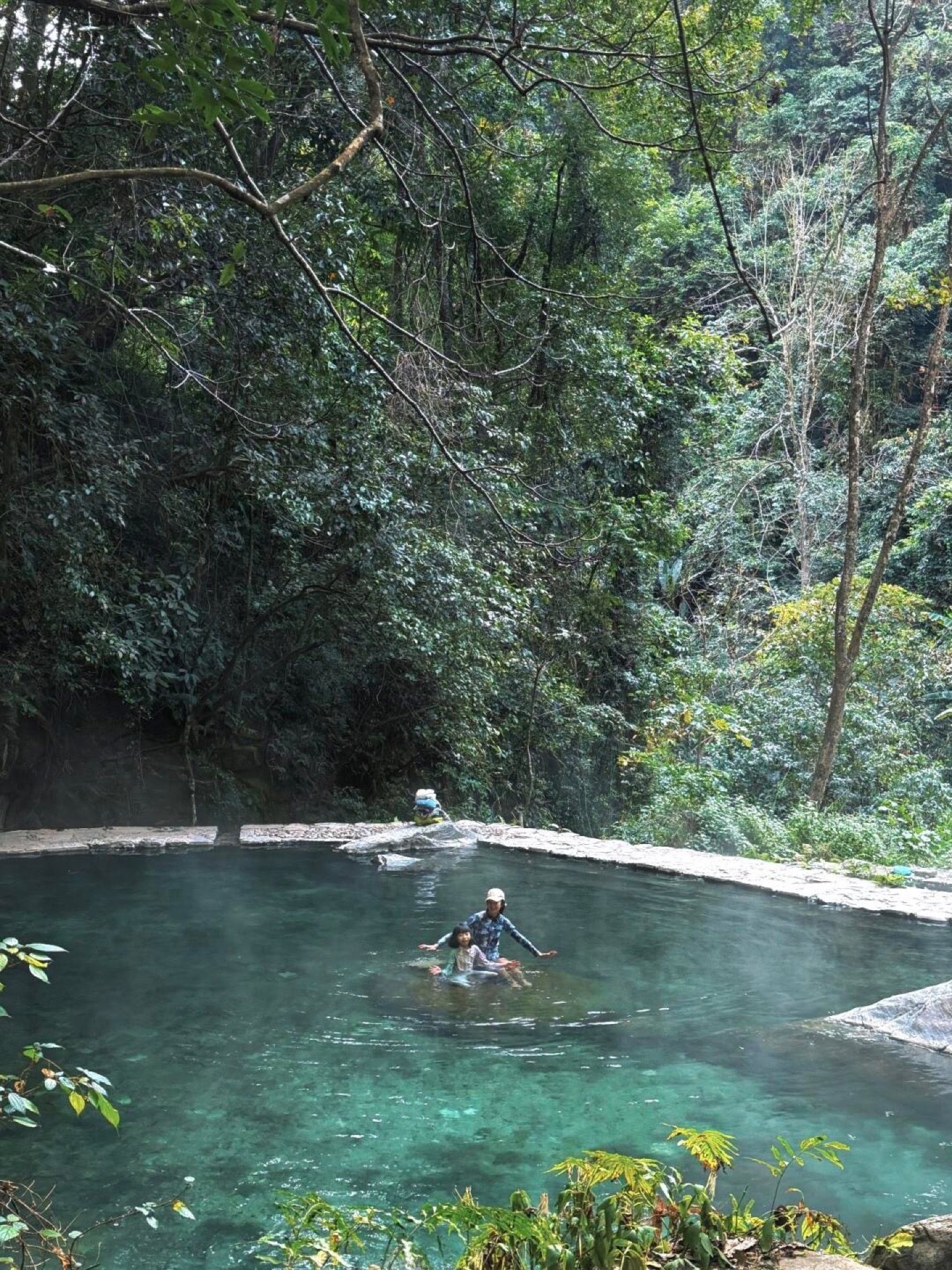 Wild natural hot spring pool tucked into the forest at Tengchong's Rehai — Yunnan slow culture tour