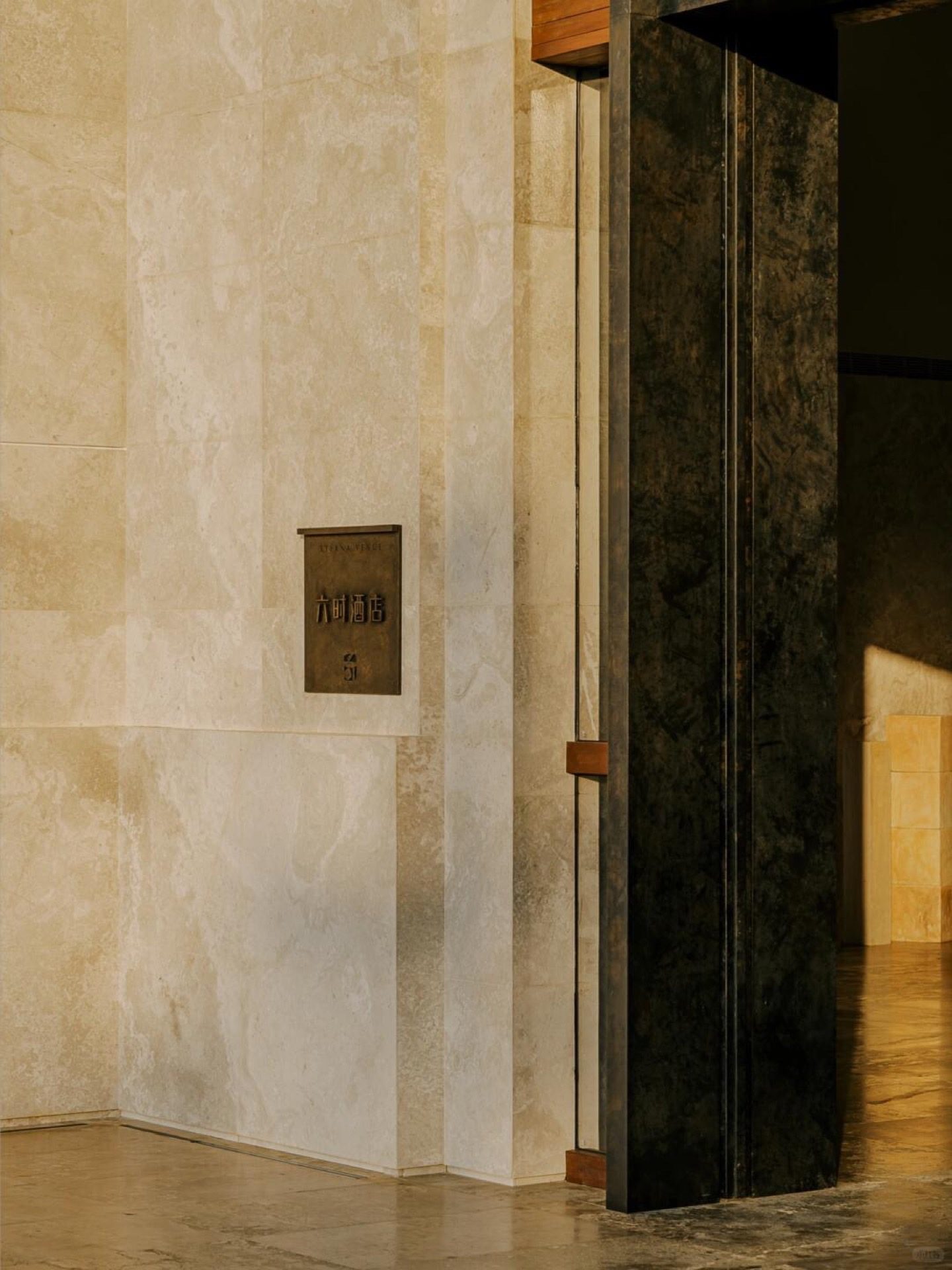Interior of a Jingmai Mountain lodge room with views across the misty tea gardens at dawn — Yunnan tropical tour