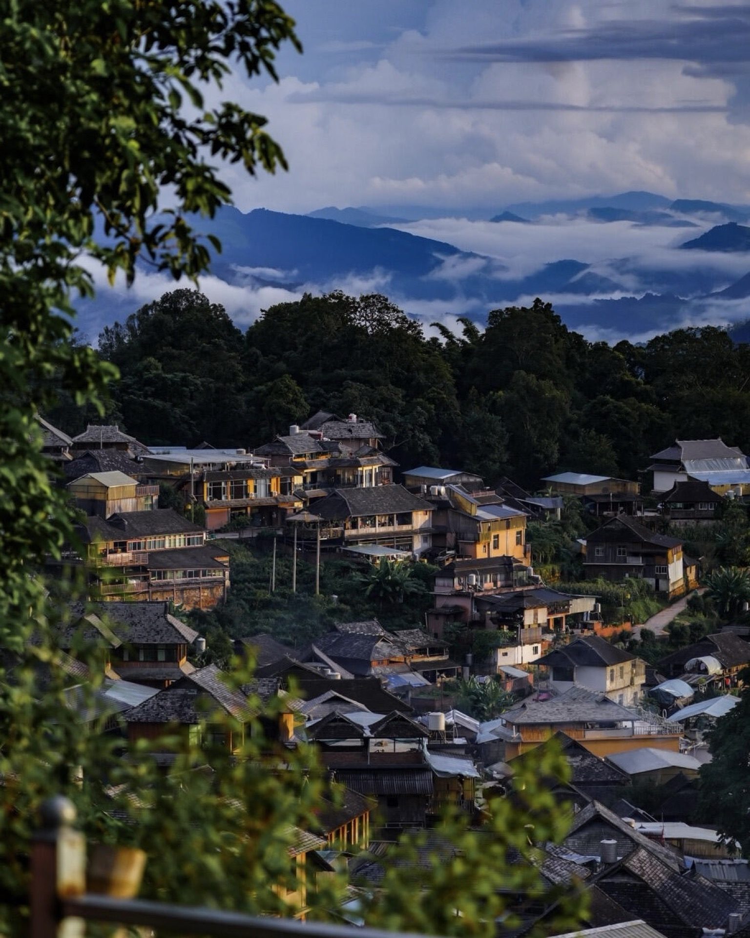 Hilltop vista over ancient Bulang and Dai villages on Jingmai Mountain — Yunnan tropical tour