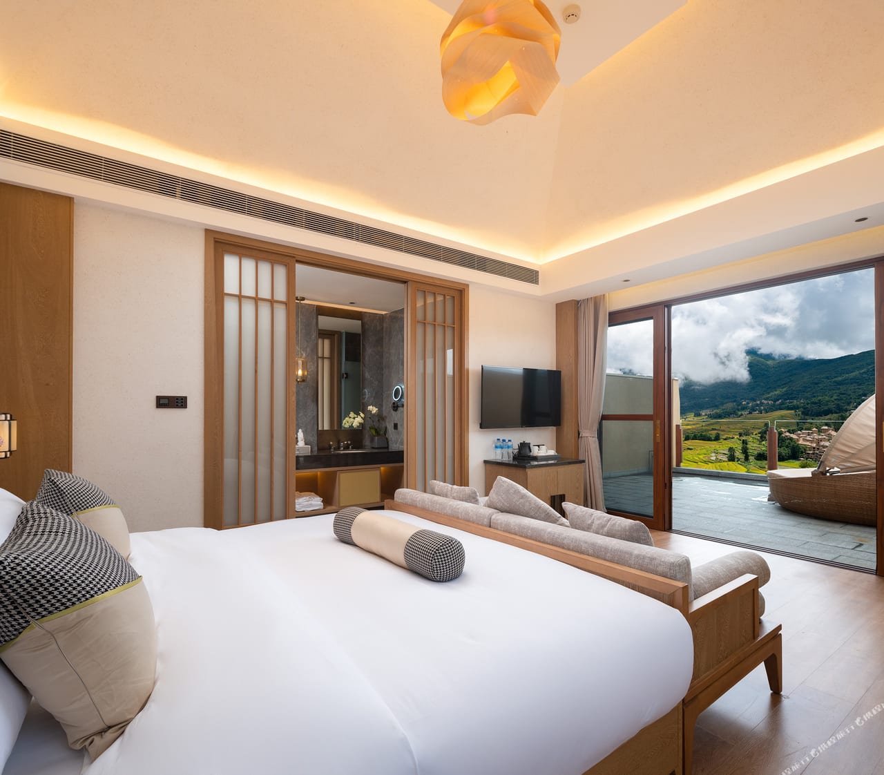 Duoyishu Half-Mountain — bedroom opening onto the terrace view