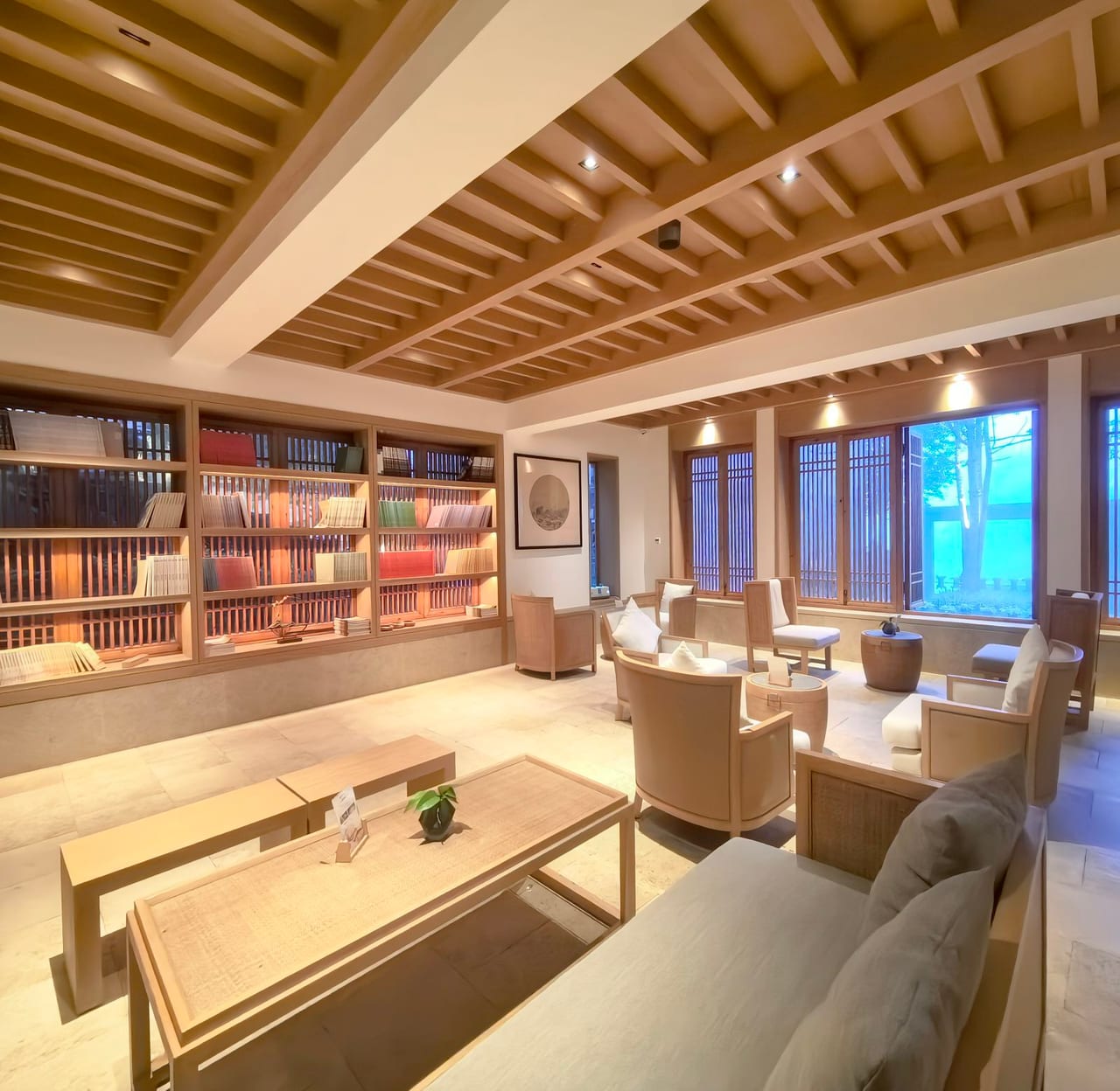 Oness Resort — the library lounge under a timber ceiling