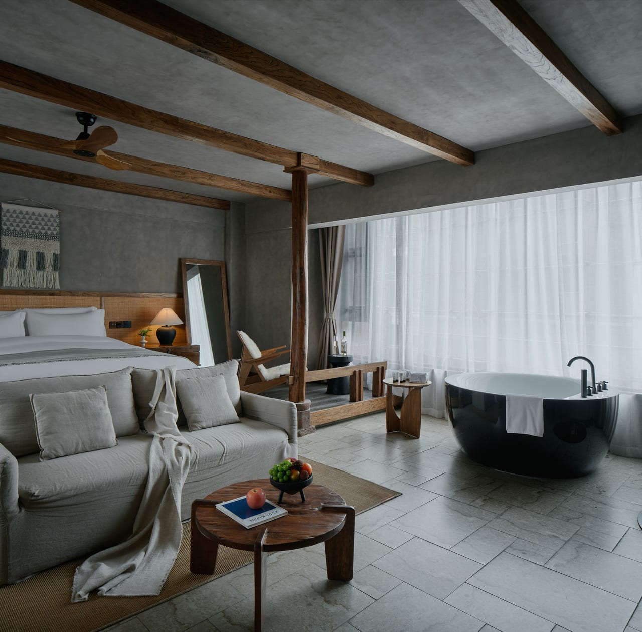 Vacilando Siguniang — suite with a freestanding tub set beside the window onto the valley