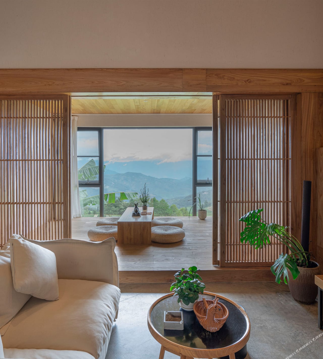Yuanshe Azheke — guest room with full-height glass onto the Yuanyang terraces