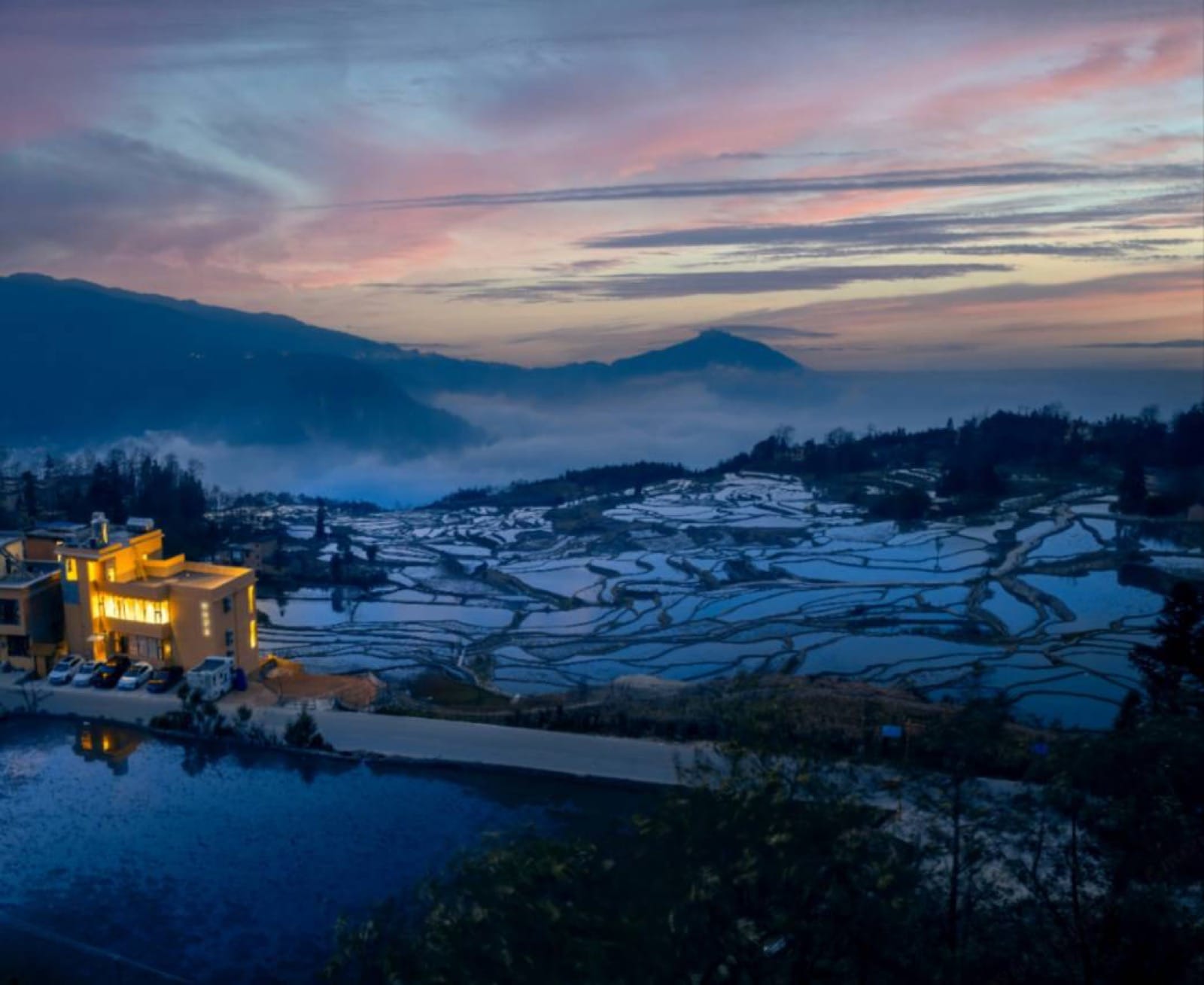 Daotian Lixiang — blue Yuanyang terraces from the lodge windows, Aichun