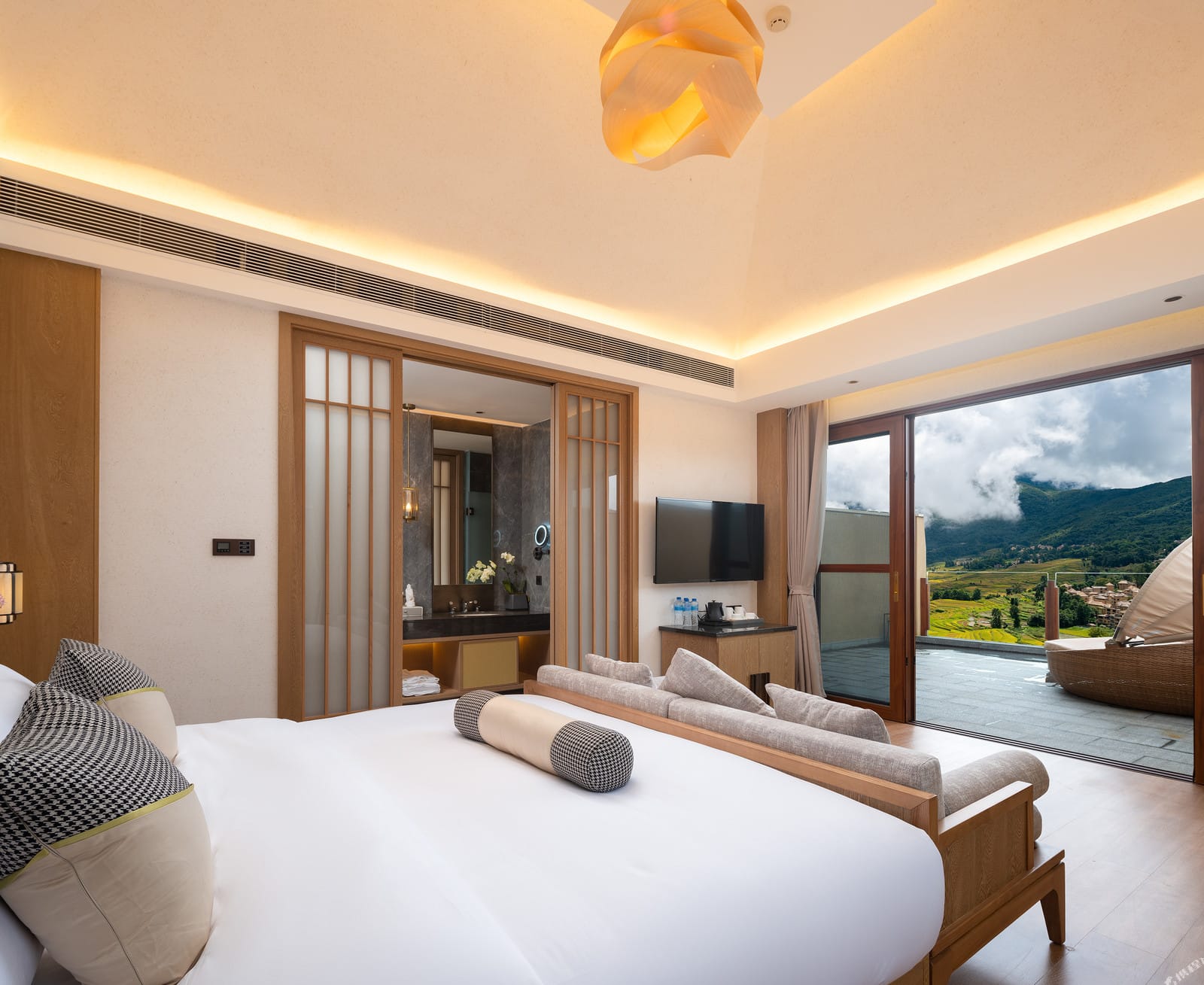 Duoyishu Half-Mountain — bedroom opening onto the terrace view